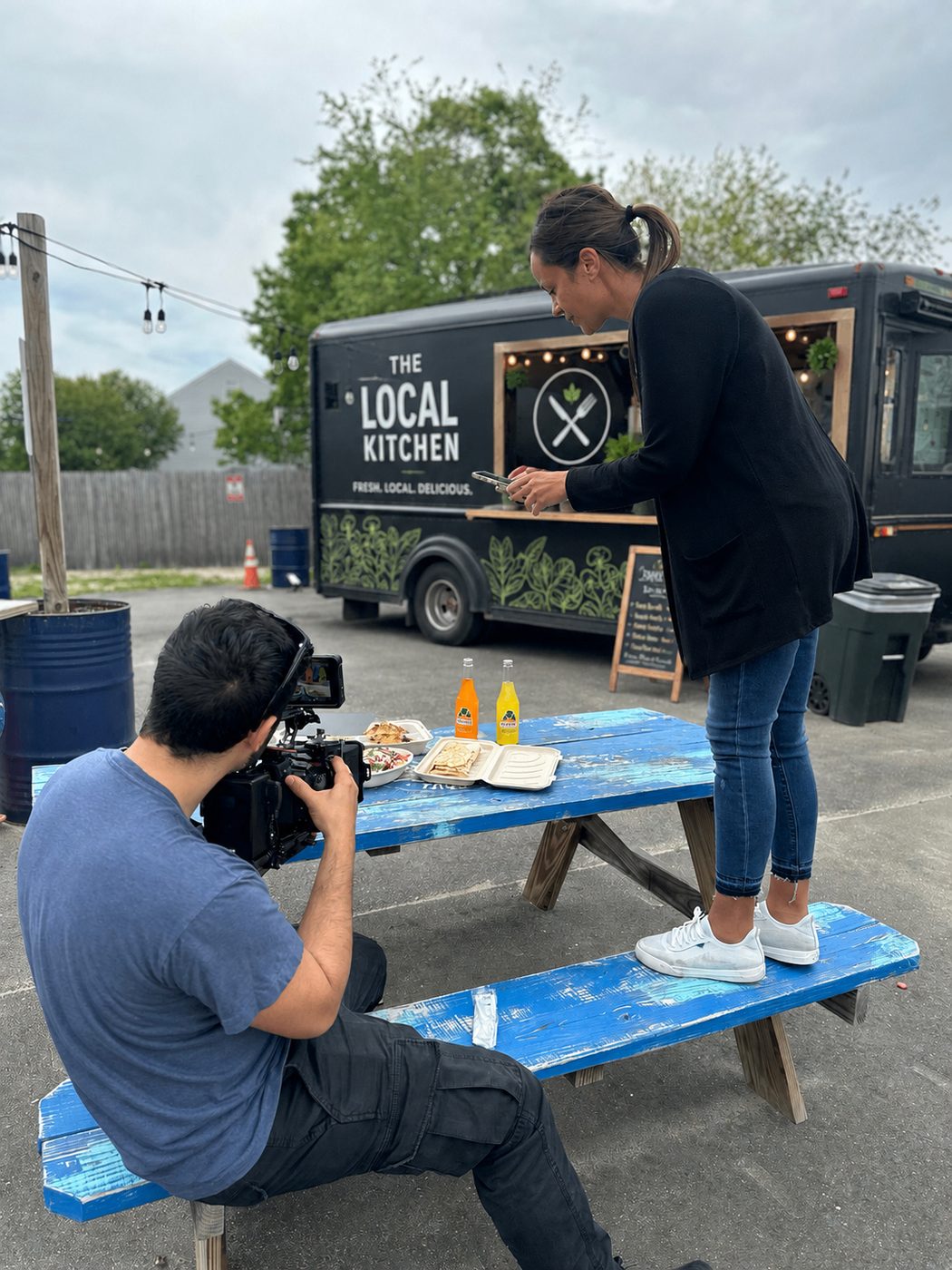 Simply Social Team capturing content for a client at a Long Island food truck during an on-site content creation session