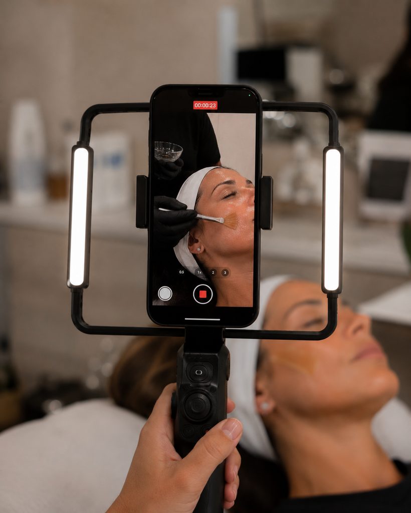Simply Social Team filming a facial treatment at a med spa for social media content